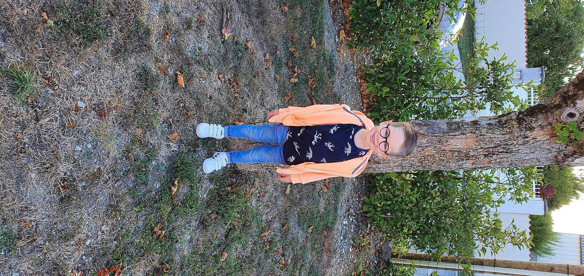 Arthur participe au concours pour gagner de l'argent avec cette photo : denim, electric_blue, fun, grass, grass_family, joy, leisure, people_in_nature, person, plant, reflection, shadow, soil, thigh, toddler, tree, trunk, water, wood