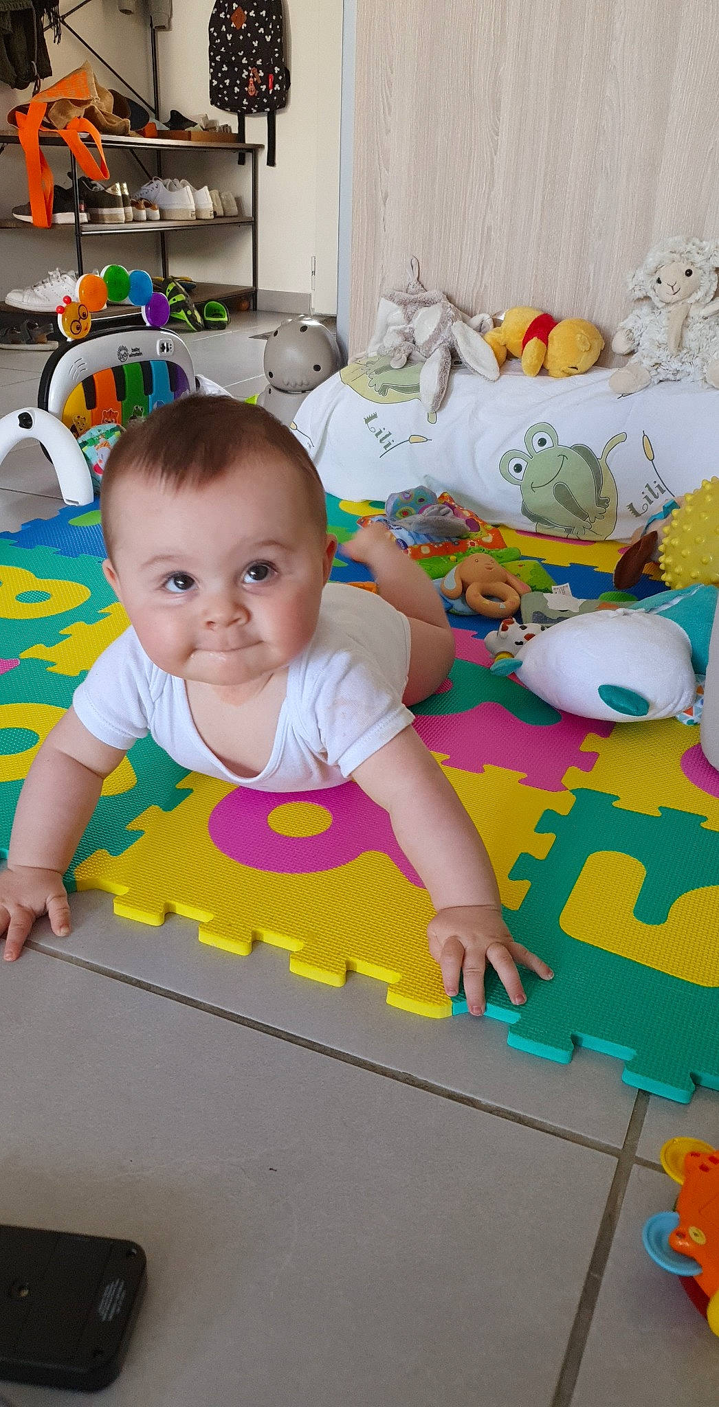 Nohé a rejoint le concours — aidez-le/la à gagner de superbes lots ! art, baby, baby_products, baby_toddler_clothing, baby_toys, child, floor, flooring, fun, happy, leisure, linens, pattern, person, play, playmat, product, room, sitting, toddler