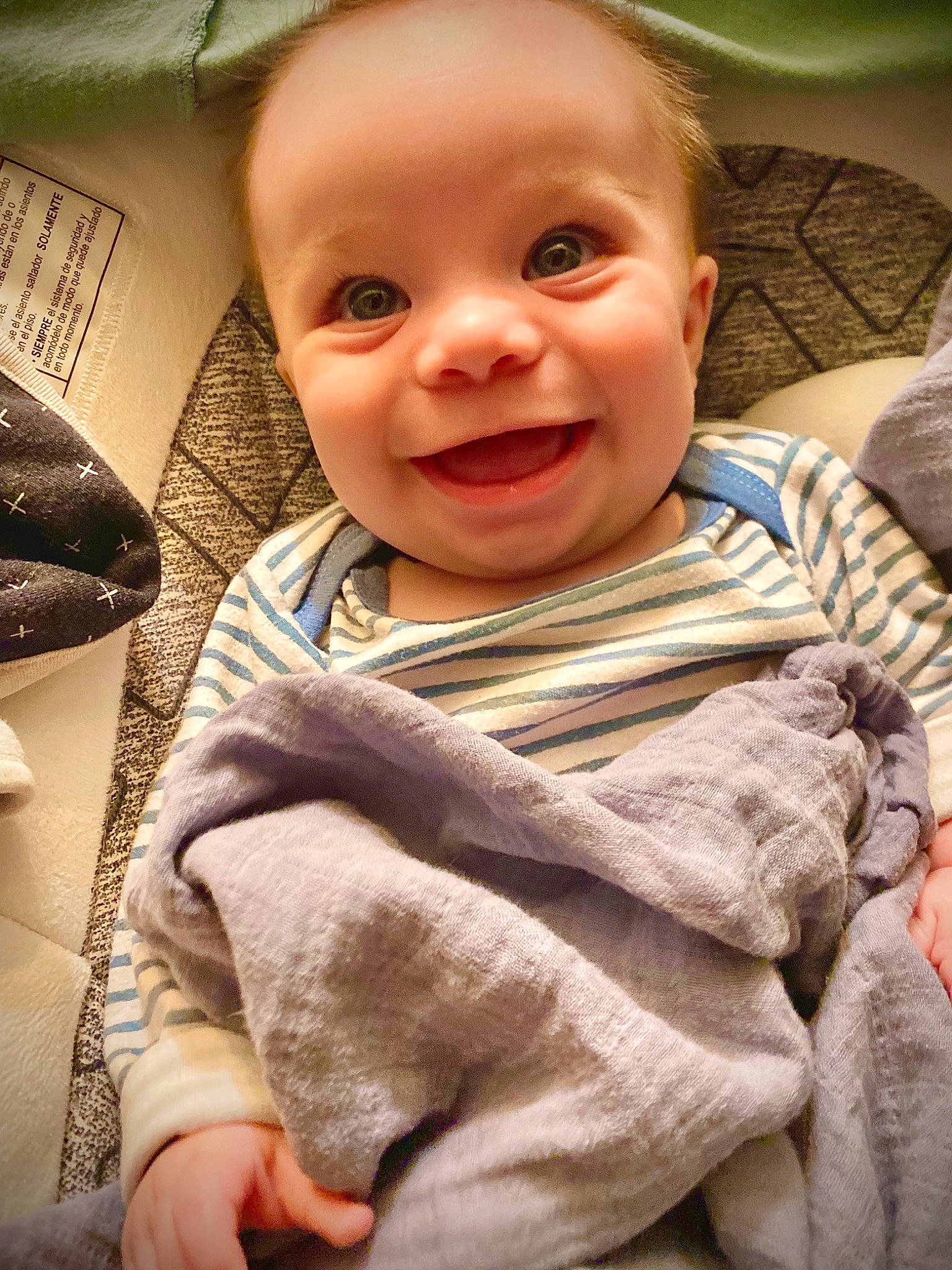 Axl is registered to the contest to win money with this photo: baby, baby_toddler_clothing, cheek, chin, comfort, eye, facial_expression, finger, happy, human, iris, joy, lip, mouth, nose, person, product, skin, sleeve, smile