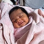 baby, newborn, smile, sleeping, blanket, pink, soft, cute, infant, face, wrapped, child, cozy, indoors, portrait, happy, young, person, warm, resting