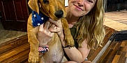 Enzo joined the competition — help win amazing prizes! woman, dog, indoor, wooden_floor, smiling, blonde_hair, bandana, pet, animal, human, flooring, casual, holding, cute, friendly, home, portrait, happy, kneeling, domestic