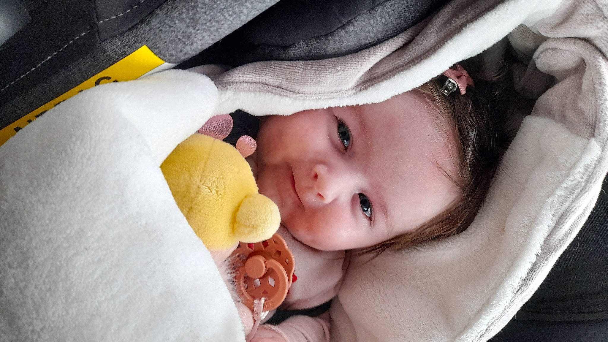 Constance participe au concours pour gagner de l'argent avec cette photo : baby, cheek, comfort, eye, eyebrow, eyelash, finger, hand, happy, headgear, lip, mouth, nail, nose, person, pink, product, skin, smile, textile