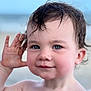 Azlynn joined the competition — help win amazing prizes! toddler, child, face, blue_eyes, wet_hair, beach, portrait, skin, smile, hand, ear, outdoor, head, person, closeup, baby, summer, water, cute, expression