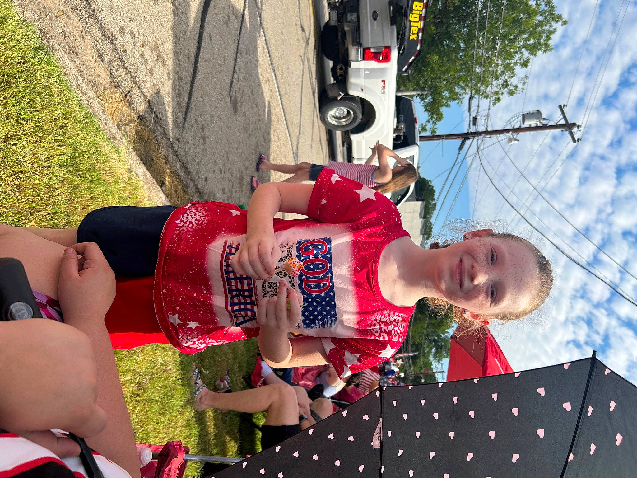 Izzabelle joined the competition — help win amazing prizes! abdomen, car, event, fun, happy, human_leg, joy, knee, leisure, pattern, person, recreation, red, shorts, sky, thigh, tire, tree, trunk, waist