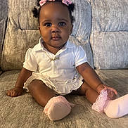 Paisley joined the competition — help win amazing prizes! baby, child, girl, bow, pink, socks, lace, white_dress, couch, sofa, indoors, portrait, sitting, cute, infant, person, clothing, happy, home, furniture