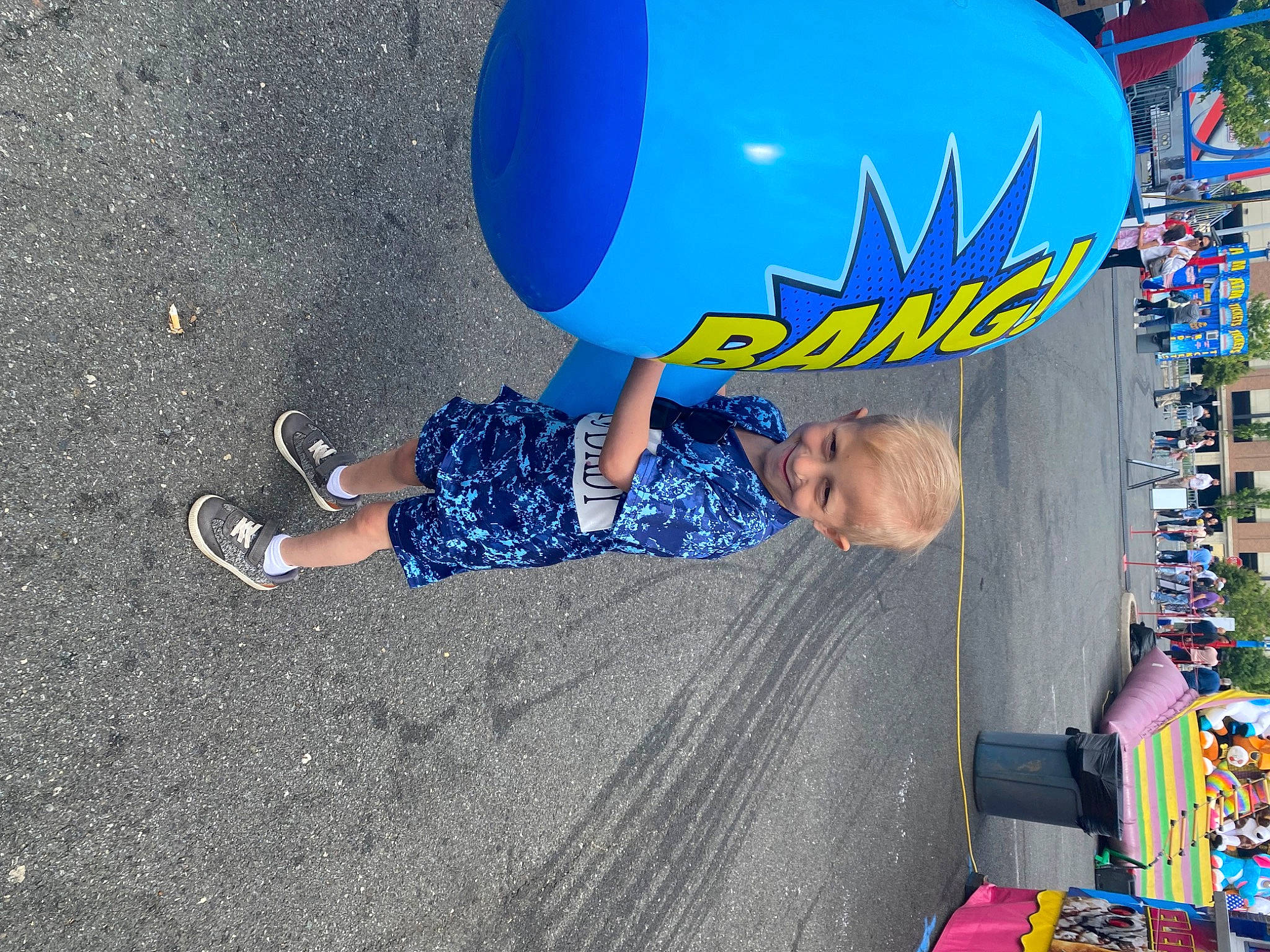 Rj Dawson joined the competition — help win amazing prizes! asphalt, balloon, child, city, concrete, electric_blue, fun, inflatable, joy, leisure, party_supply, person, personal_protective_equipment, play, public_space, recreation, road_surface, sidewalk, t_shirt, toddler