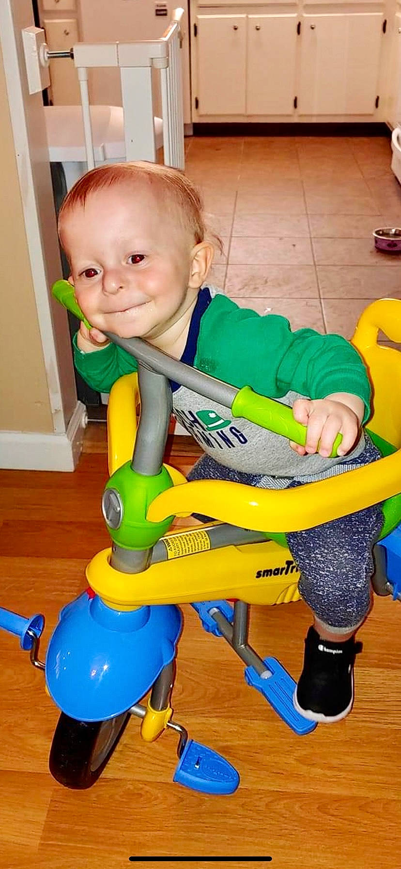 Rj Dawson is registered to the contest to win money with this photo: baby, baby_products, baby_toddler_clothing, balance, chair, child, cleanliness, electric_blue, fun, human_body, human_leg, joy, knee, person, plastic, play, sitting, smile, thigh, tire