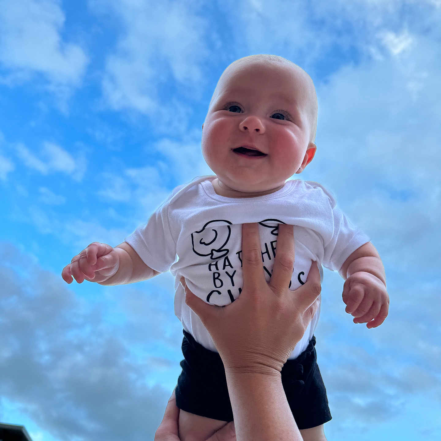 Ryann joined the competition — help win amazing prizes! ankle, baby, bodypart, clothing, face, finger, hand, happy, head, longsleeve, newborn, person, photography, portrait, shirt, shorts, sleeve, smile, t_shirt, wrist