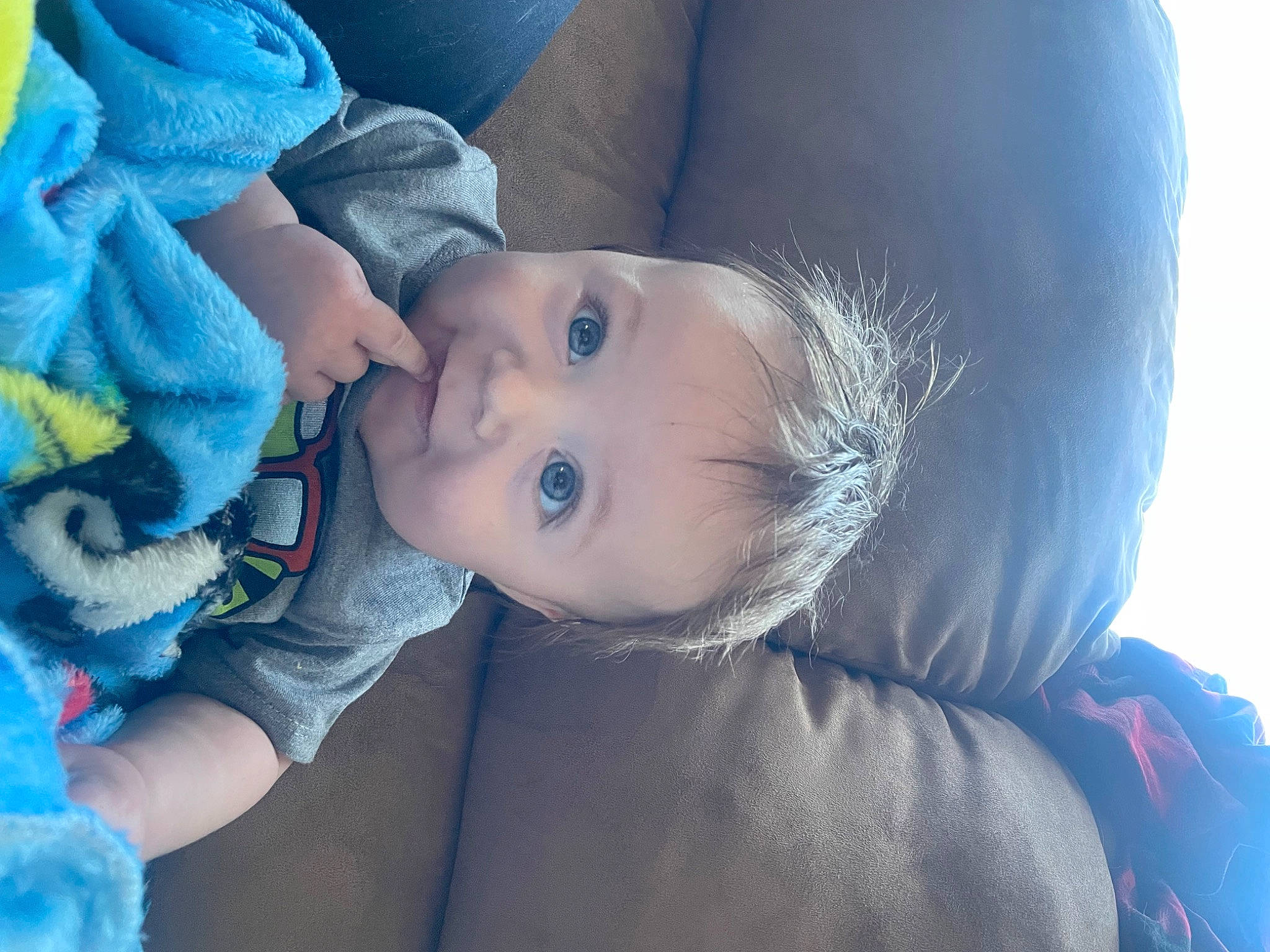 Oliver is registered to the contest to win money with this photo: azure, baby, baby_products, baby_toddler_clothing, blue, cheek, child, comfort, electric_blue, eyebrow, face, flash_photography, fun, happy, iris, mouth, nose, person, sitting, skin