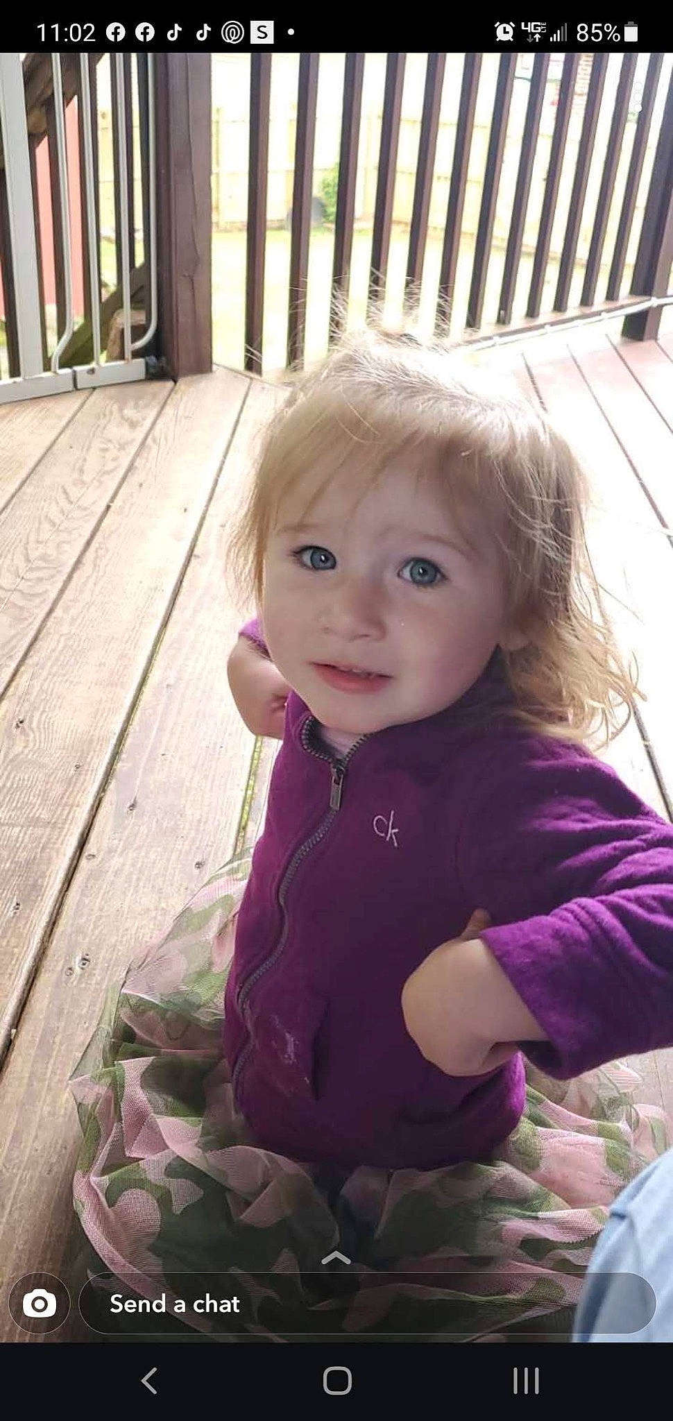 Abigail joined the competition — help win amazing prizes! baby, baby_toddler_clothing, cheek, child, eye, face, fun, grass, hair, happy, head, iris, lip, nose, person, pink, purple, skin, smile, toddler