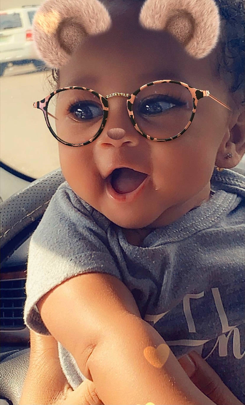 Raina is registered to the contest to win money with this photo: cheek, cool, eyebrow, eyelash, eyewear, forehead, gesture, glasses, goggles, happy, jaw, lip, mouth, neck, nose, person, skin, sleeve, smile, sunglasses