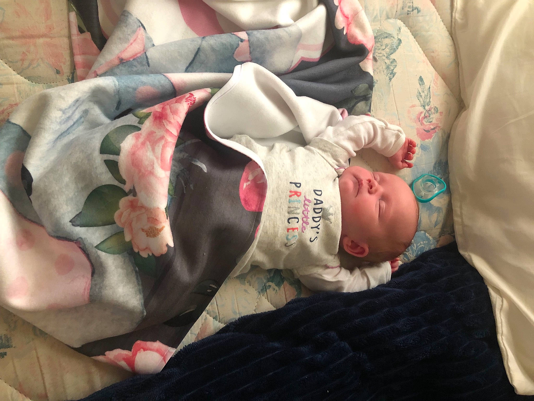 Rose joined the competition — help win amazing prizes! baby, baby_carriage, baby_products, baby_toddler_clothing, bedding, bedtime, carmine, child, comfort, head, human_body, human_leg, knee, lap, linens, nap, person, sitting, sleeve, thigh