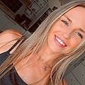 Laura C.