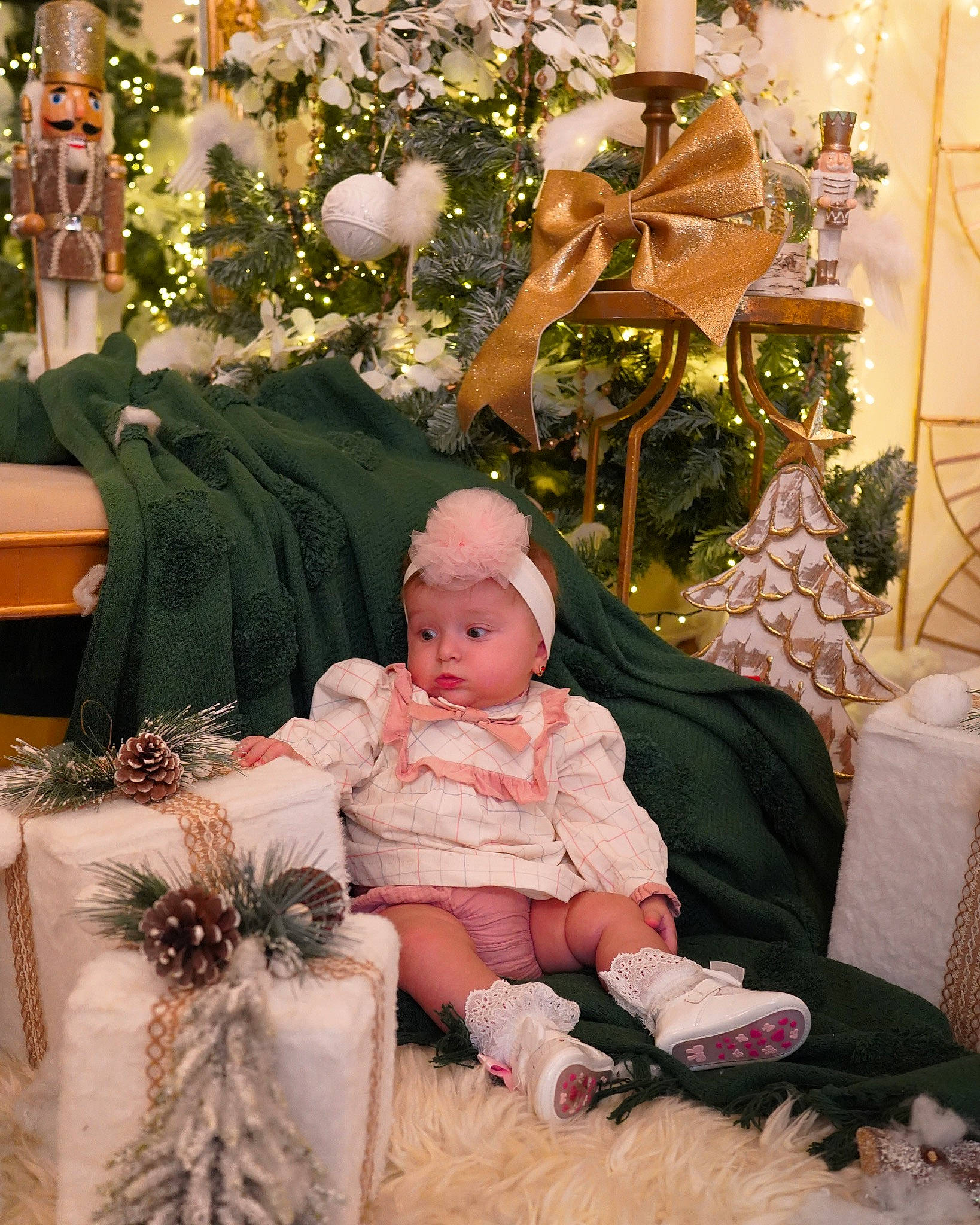 Evelyn is registered to the contest to win money with this photo: baby, baby_toddler_clothing, beauty, child, christmas, christmas_decoration, christmas_eve, christmas_ornament, christmas_tree, event, happy, headwear, holiday, ornament, people, person, photograph, plant, toddler, tradition