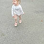 toddler, child, outdoor, pavement, grass, curb, sidewalk, happy, walking, shoes, braids, long_sleeve_shirt, pants, smiling, young_child, daylight, casual_clothing, nature, playful, person