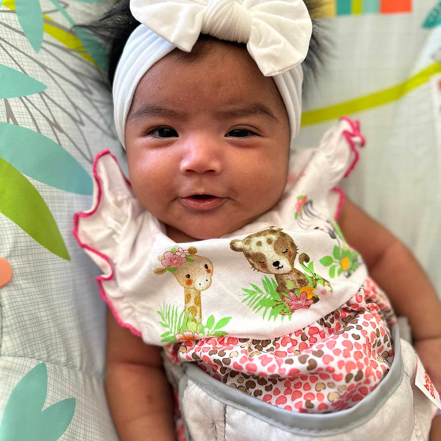Isabella is registered to the contest to win money with this photo: accessories, baby, clothing, cushion, dress, face, furniture, hat, head, headband, homedecor, jewelry, necklace, newborn, people, person, photography, portrait, quilt, t_shirt