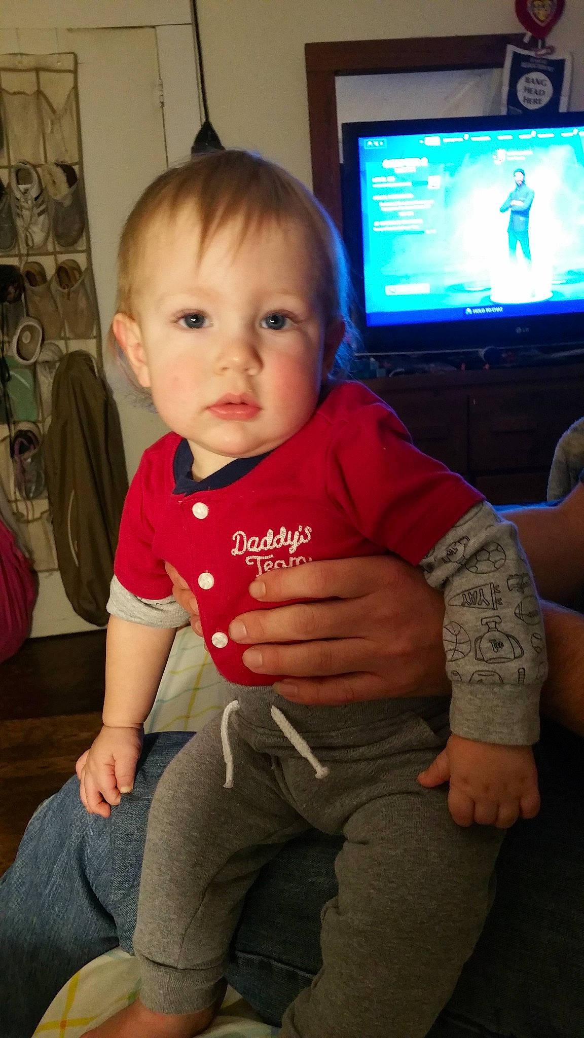 Dorian joined the competition — help win amazing prizes! baby, cheek, child, electronic_device, lap, person, sitting, skin, standing, t_shirt, technology, toddler