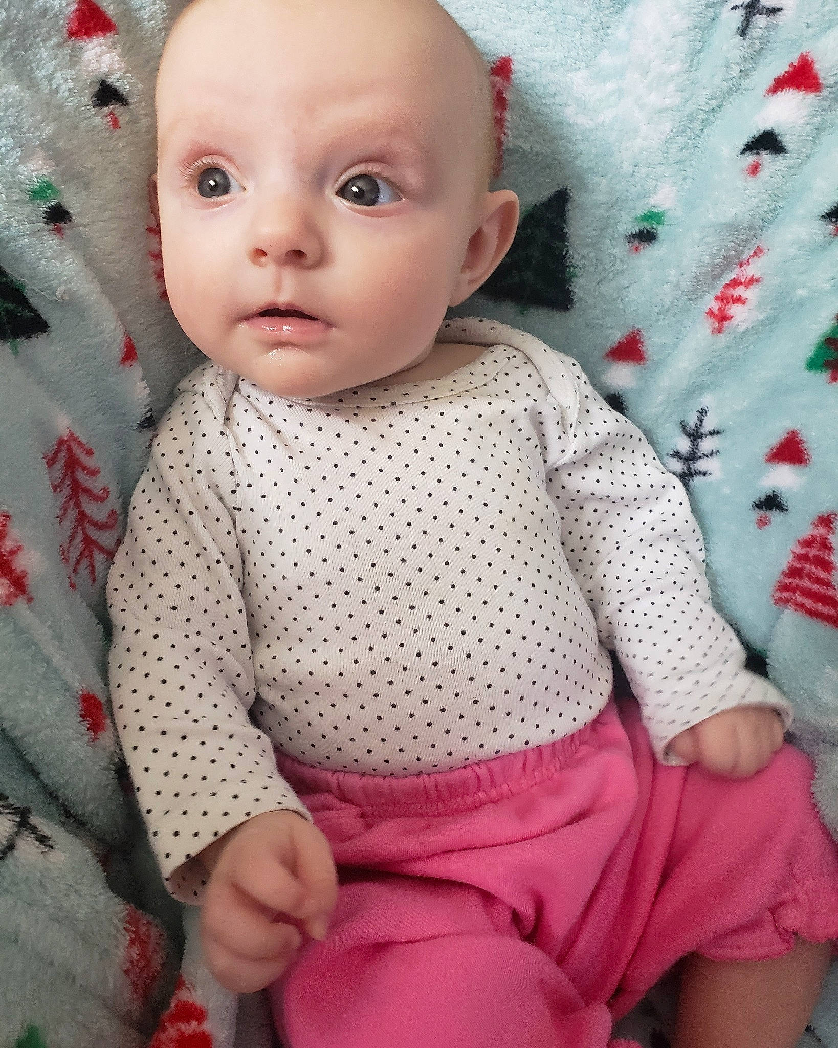 Logan joined the competition — help win amazing prizes! baby, baby_toddler_clothing, cheek, child, design, doll, eye, face, head, knitting, lip, pattern, person, pink, sitting, skin, sleeve, toddler, toy, wool
