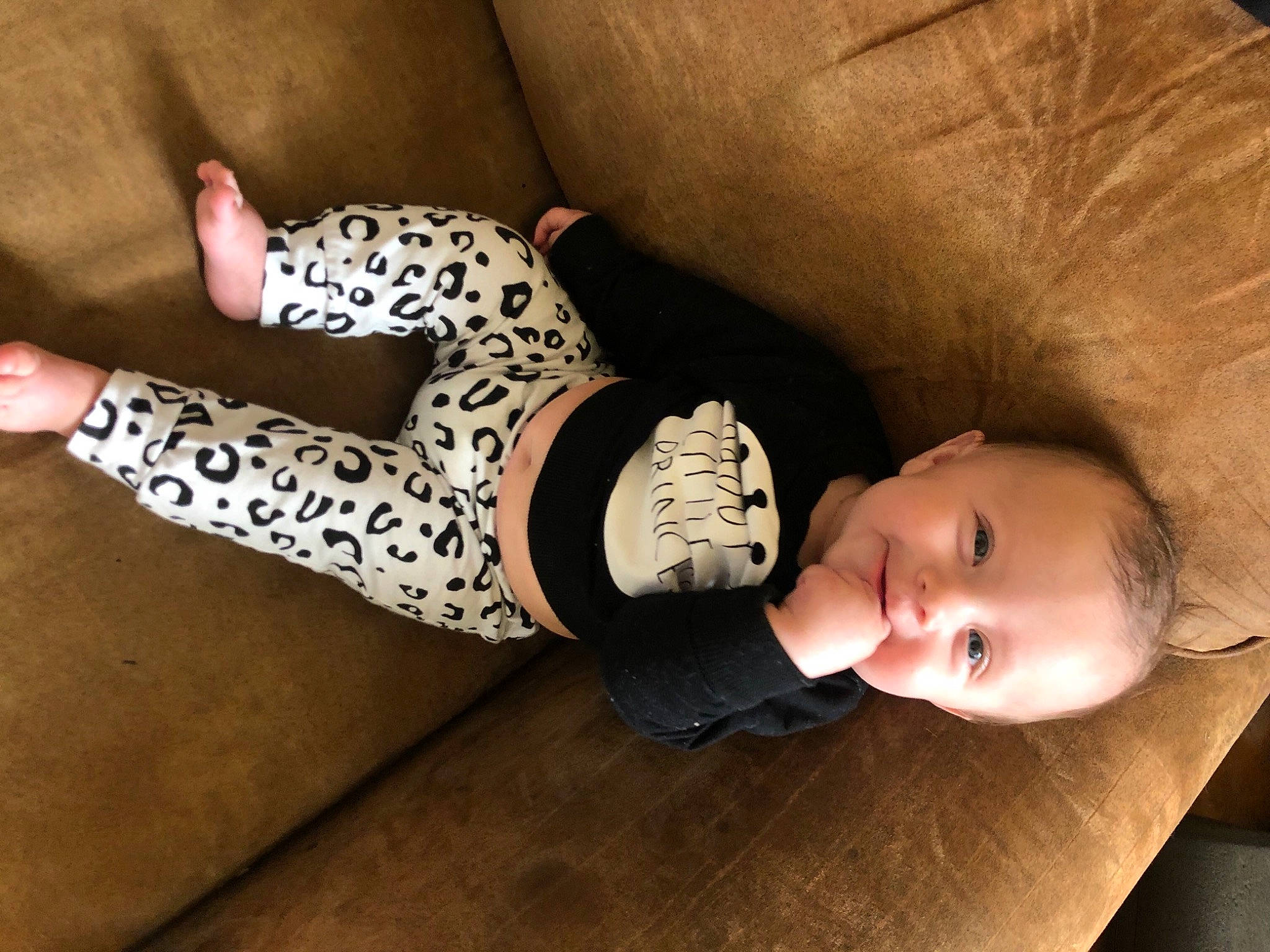 Serenity is registered to the contest to win money with this photo: baby, baby_toddler_clothing, comfort, finger, floor, flooring, happy, headgear, human_body, human_leg, joy, knee, linens, mammal, person, skin, sleeve, smile, thigh, toddler