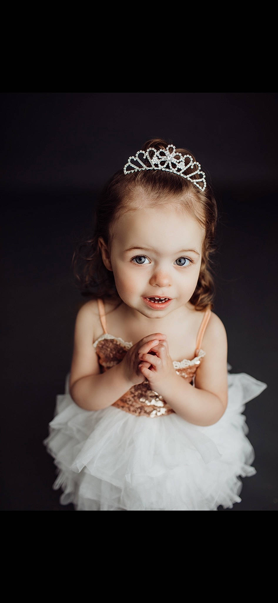 Kaliah joined the competition — help win amazing prizes! baby_toddler_clothing, bridal_accessory, bridal_clothing, bridal_party_dress, child, day_dress, dress, embellishment, face, flash_photography, gown, hairstyle, happy, headpiece, iris, one_piece_garment, person, smile, tiara, toddler