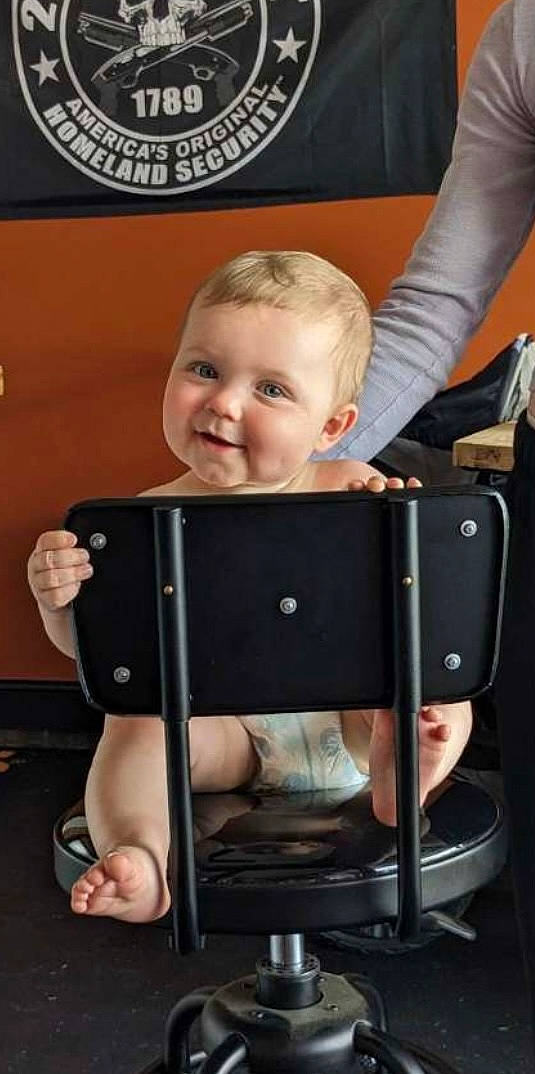 Sydney joined the competition — help win amazing prizes! baby, baby_products, baby_safety, baby_toddler_clothing, cheek, child, comfort, eye, foot, fun, gadget, human_body, human_leg, joint, joy, person, room, sitting, smile, t_shirt