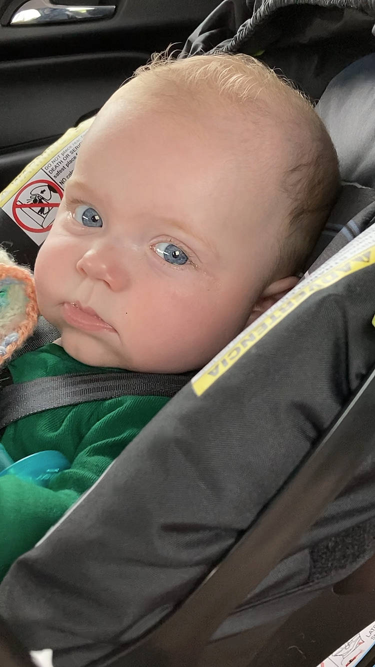 Sydney joined the competition — help win amazing prizes! baby, baby_carriage, baby_products, baby_safety, baby_toddler_clothing, car_seat, cheek, child, comfort, eyebrow, eyelash, fun, iris, lip, nose, person, sitting, smile, toddler