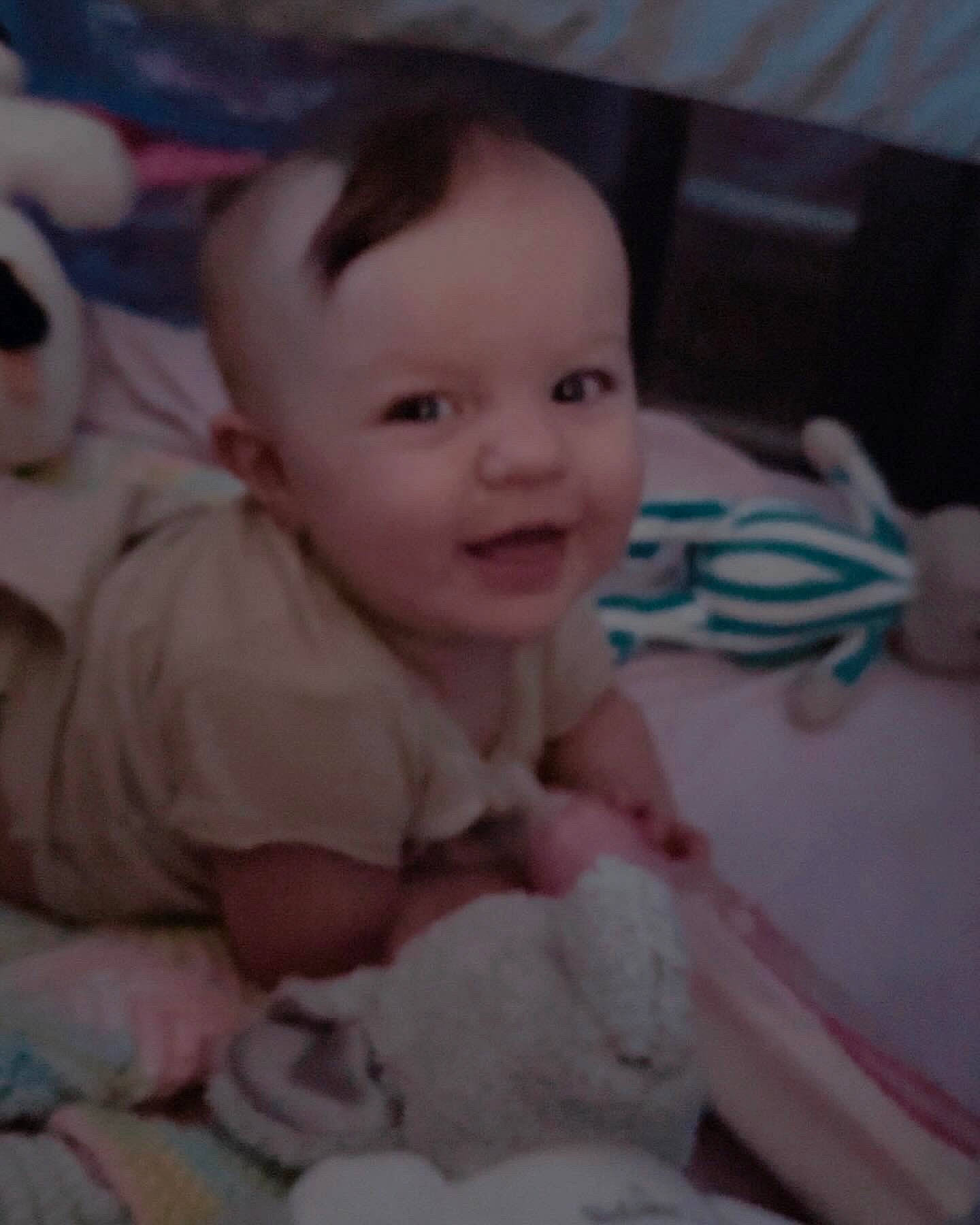 Ruby is registered to the contest to win money with this photo: baby, baby_toddler_clothing, cheek, child, comfort, ear, eye, finger, fun, happy, head, iris, linens, mouth, nose, person, room, skin, smile, thumb