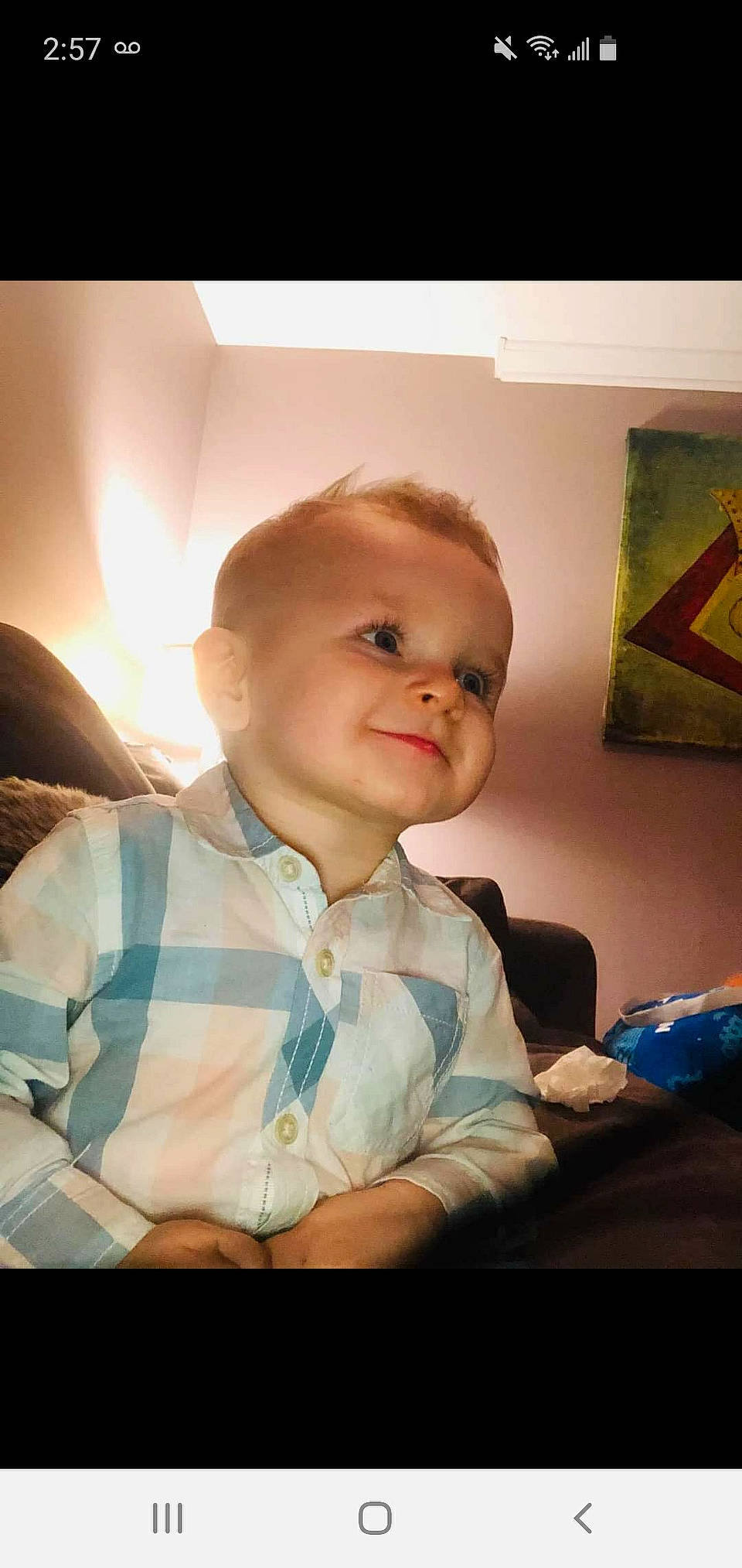 Braydon is registered to the contest to win money with this photo: baby, baby_toddler_clothing, cheek, child, comfort, elbow, flash_photography, fun, gesture, happy, human_body, iris, joy, lighting_accessory, mouth, person, room, sitting, smile, thumb