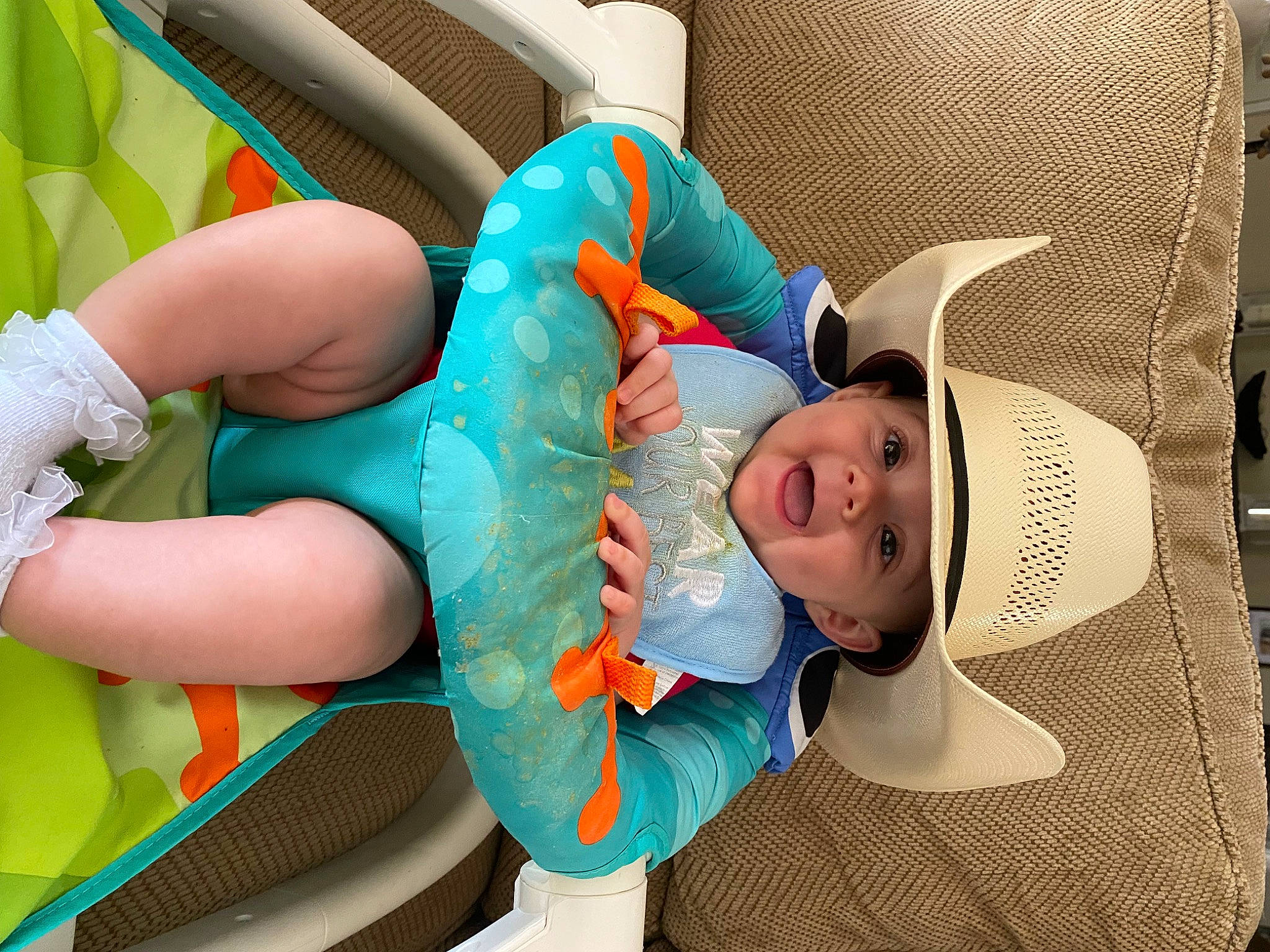 Lilah is registered to the contest to win money with this photo: baby, baby_products, baby_safety, baby_toddler_clothing, child, comfort, electric_blue, fashion_accessory, fun, hat, headwear, health_care, human_leg, leisure, person, play, product, room, sock, textile