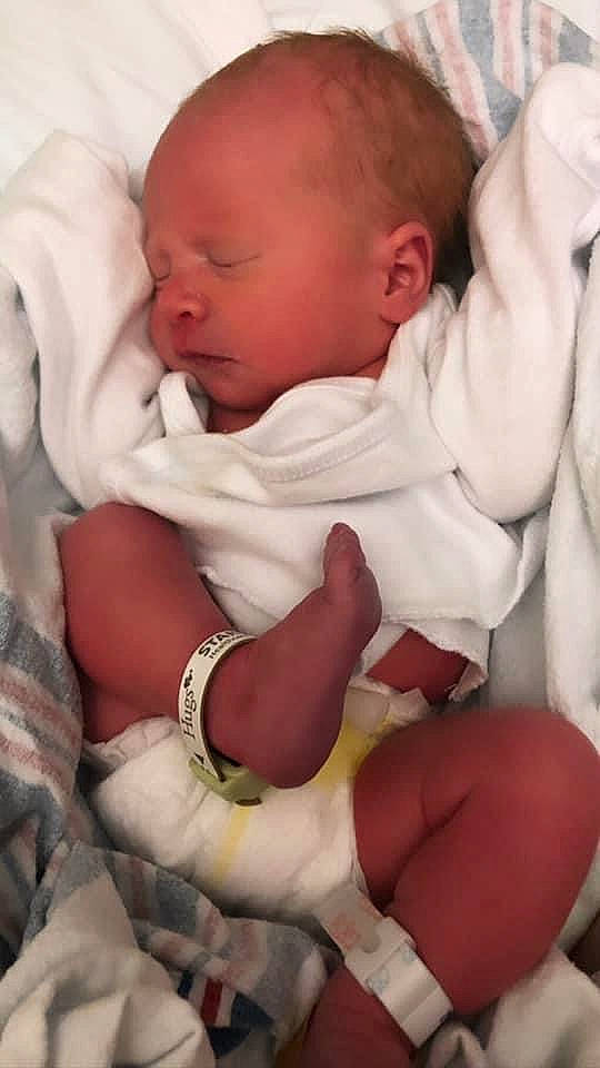 Layne is registered to the contest to win money with this photo: abdomen, baby, baby_products, baby_sleeping, baby_toddler_clothing, bedtime, cheek, child, comfort, finger, gesture, happy, linens, mouth, nail, person, skin, sleep, stomach, thumb