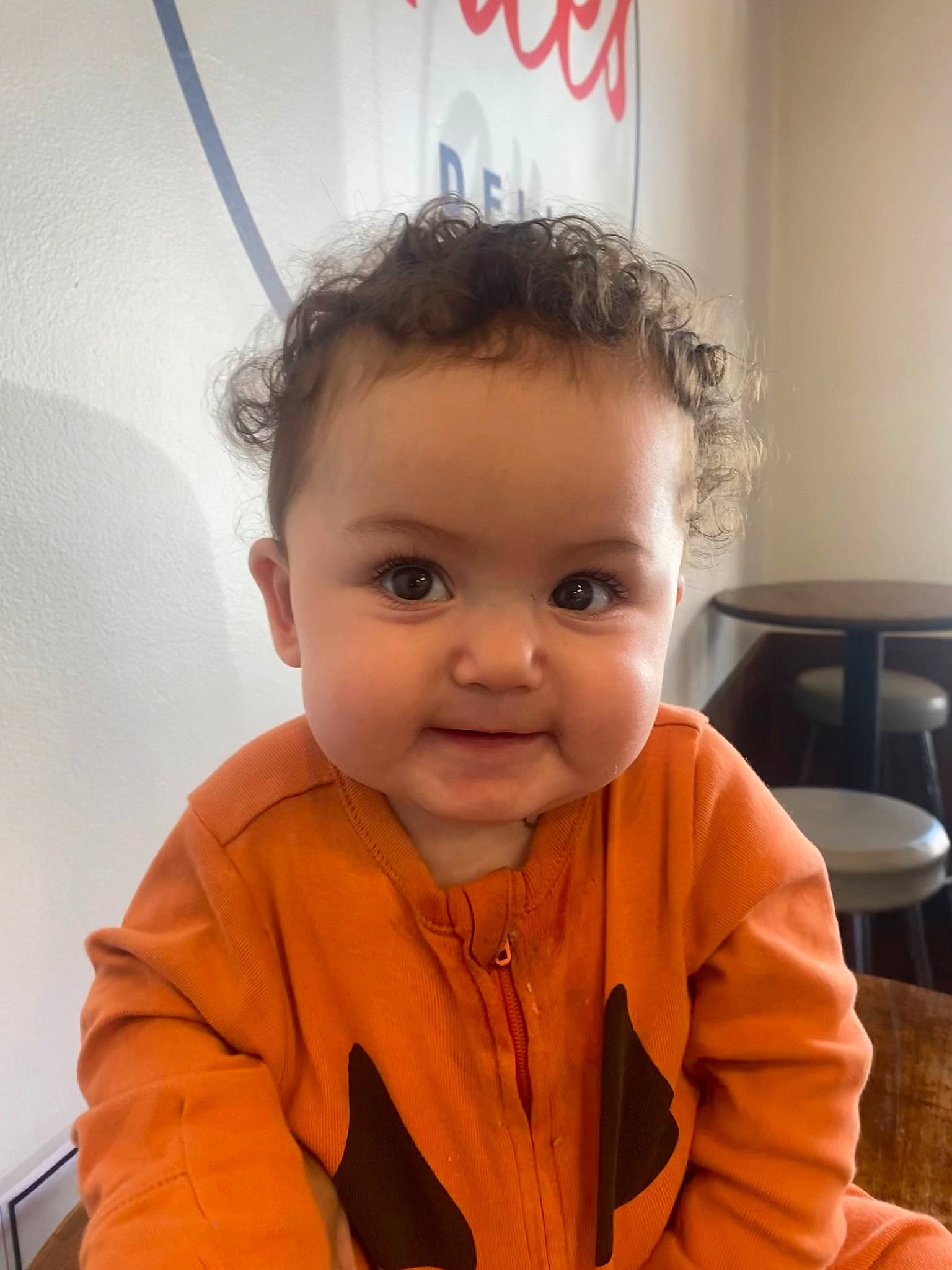 Elyse P is registered to the contest to win money with this photo: baby, baby_toddler_clothing, cheek, child, chin, eyebrow, eyelash, flooring, forehead, fun, happy, iris, nose, person, room, sitting, skin, sleeve, smile, standing