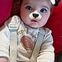 baby, infant, child, car_seat, seatbelt, harness, buckle, onesie, face_filter, dog_filter, puppy_ears, nose_filter, blue_eyes, wide_eyes, closeup, portrait, pink_cushion, wood_headboard, hands, soft_lighting