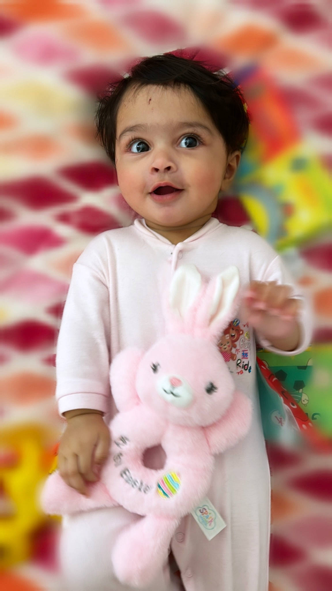 Maeve is registered to the contest to win money with this photo: baby_toddler_clothing, beauty, cheek, facial_expression, fun, happy, nose, organ, people, person, photograph, pink, product, rabbit, skin, sleeve, smile, snapshot, toddler, toy