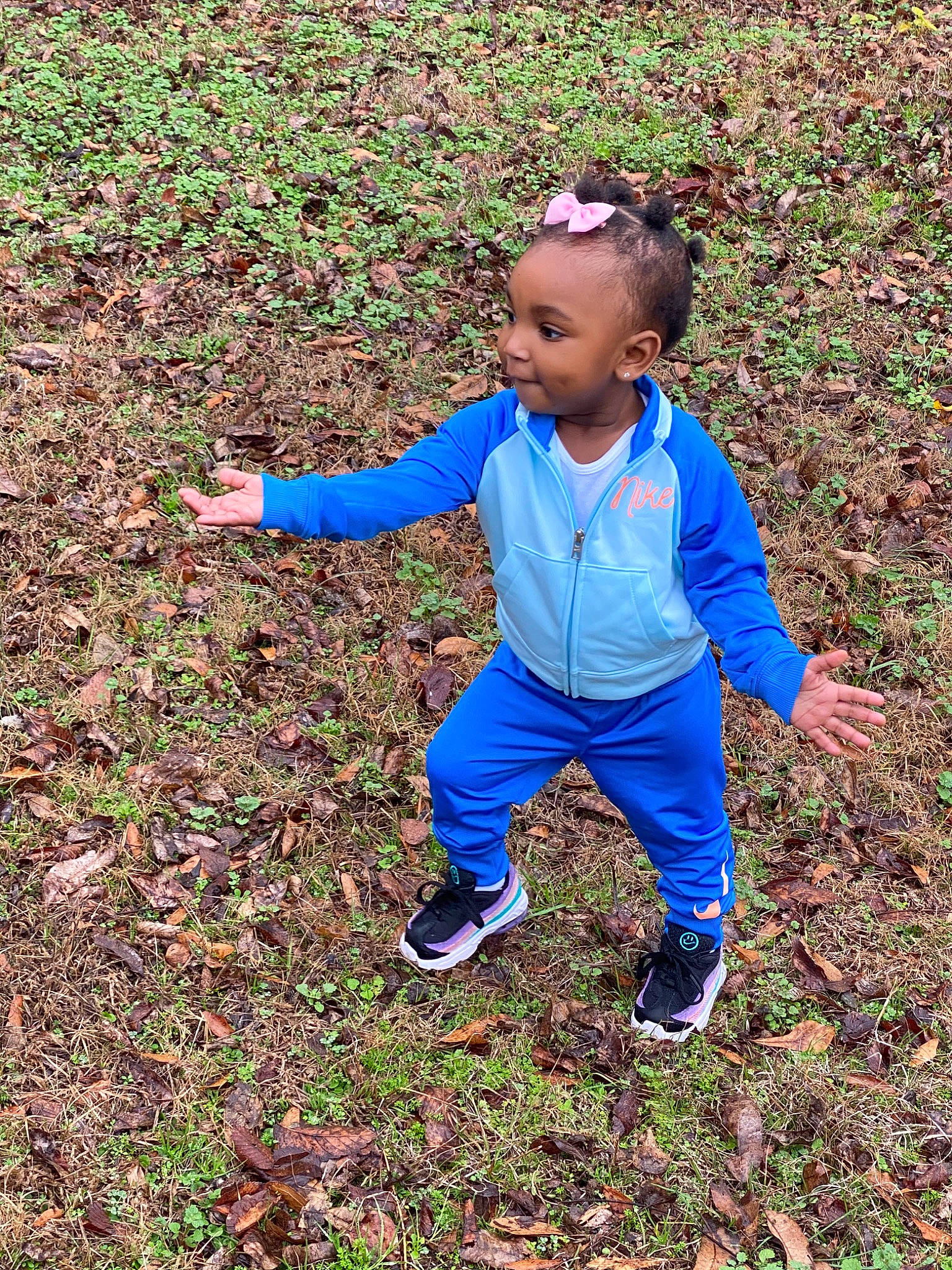 Imani is registered to the contest to win money with this photo: child, fun, joy, person, play, smile, soil, toddler