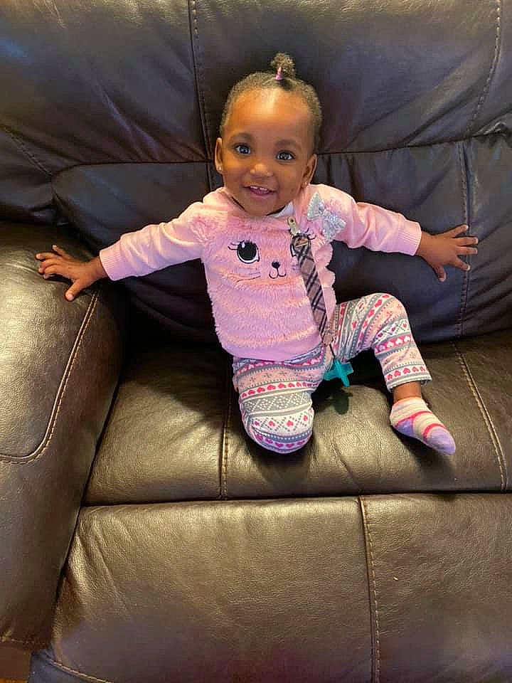 Imani is registered to the contest to win money with this photo: baby, child, furniture, joy, person, sitting, toddler