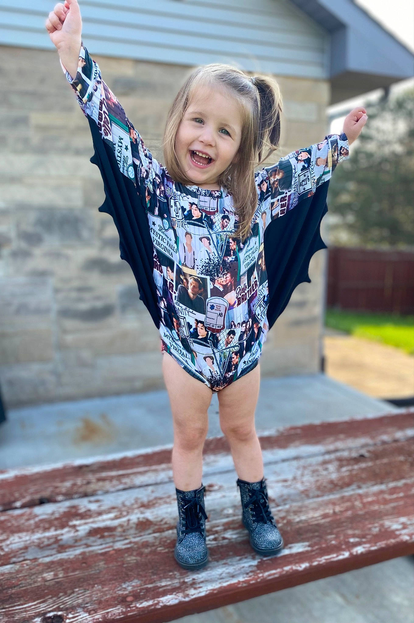 Raegan joined the competition — help win amazing prizes! blond, dance, dress, electric_blue, face, fashion_design, flash_photography, fun, grass, happy, human_body, human_leg, leisure, pattern, person, sleeve, smile, t_shirt, thigh, toddler