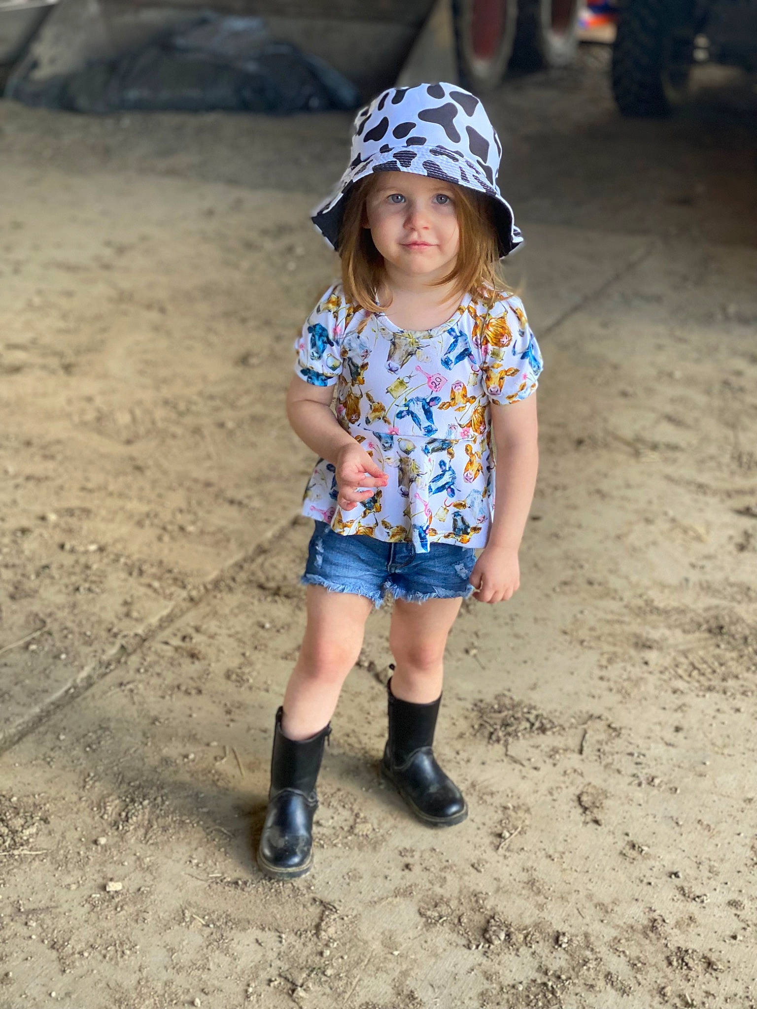 Raegan joined the competition — help win amazing prizes! cap, child, denim, electric_blue, fashion_accessory, fun, happy, hat, headwear, human_leg, joy, leisure, pattern, person, sand, shorts, sleeve, soil, sun_hat, t_shirt