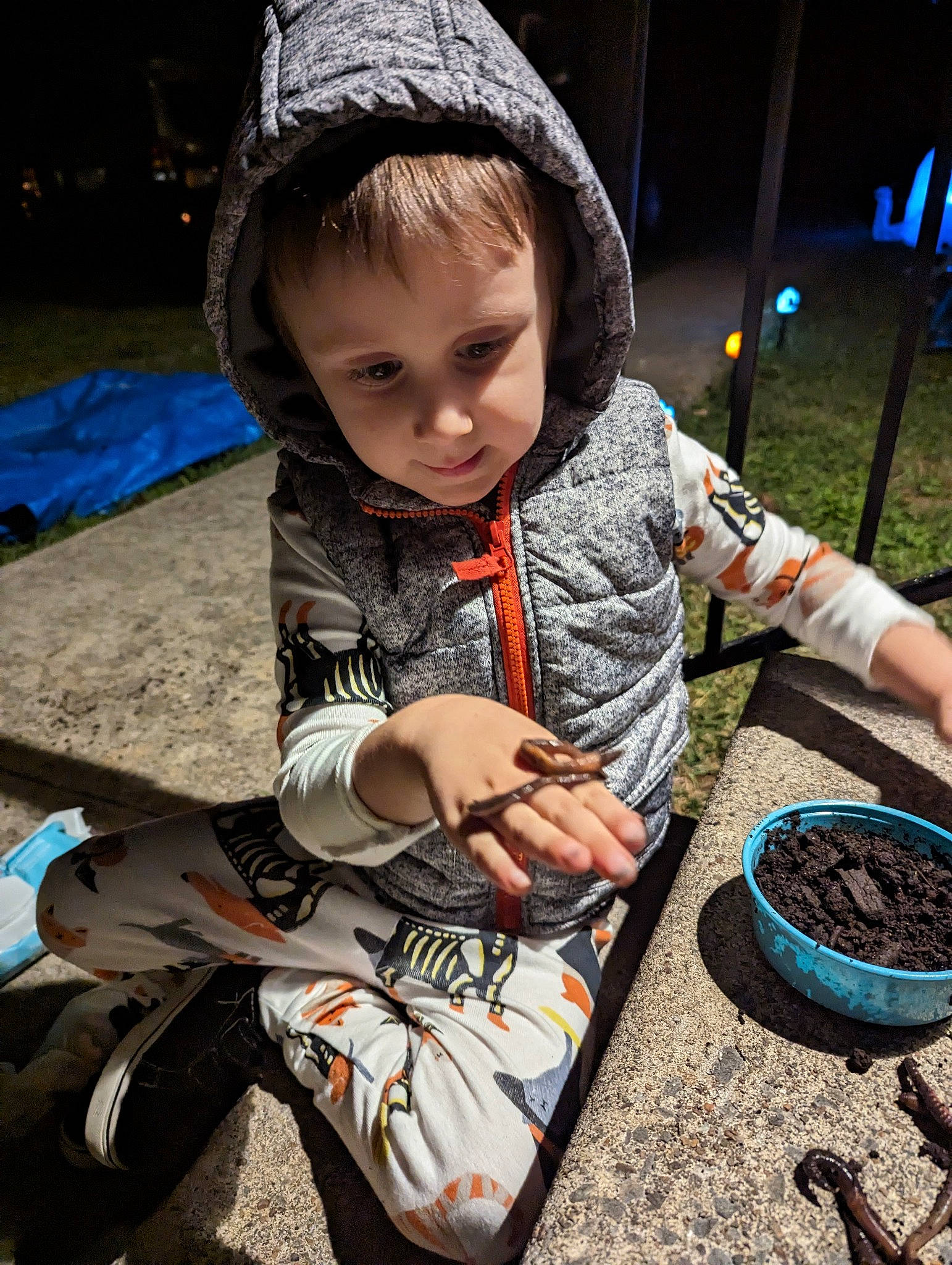 Karter is registered to the contest to win money with this photo: automotive_tire, cap, child, cool, fun, grass, hairstyle, happy, leisure, people, person, plant, play, public_space, recreation, sitting, soil, t_shirt, toddler, tree