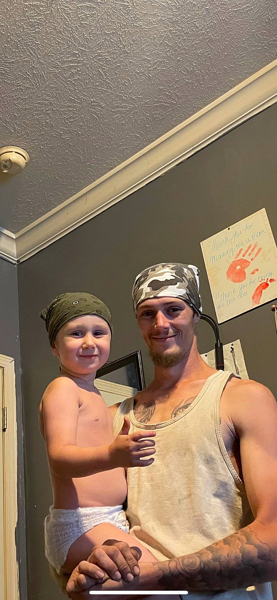 Karter joined the competition — help win amazing prizes! abdomen, barechested, cap, ceiling, chest, door, event, eyewear, fun, gesture, hairstyle, happy, headwear, joy, leisure, person, personal_protective_equipment, room, selfie, smile