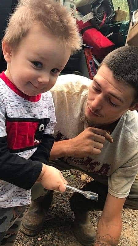 Karter is registered to the contest to win money with this photo: baby, child, event, face, facial_expression, fun, hairstyle, happy, joy, leisure, pattern, person, play, sitting, skin, smile, soil, t_shirt, thumb, toddler