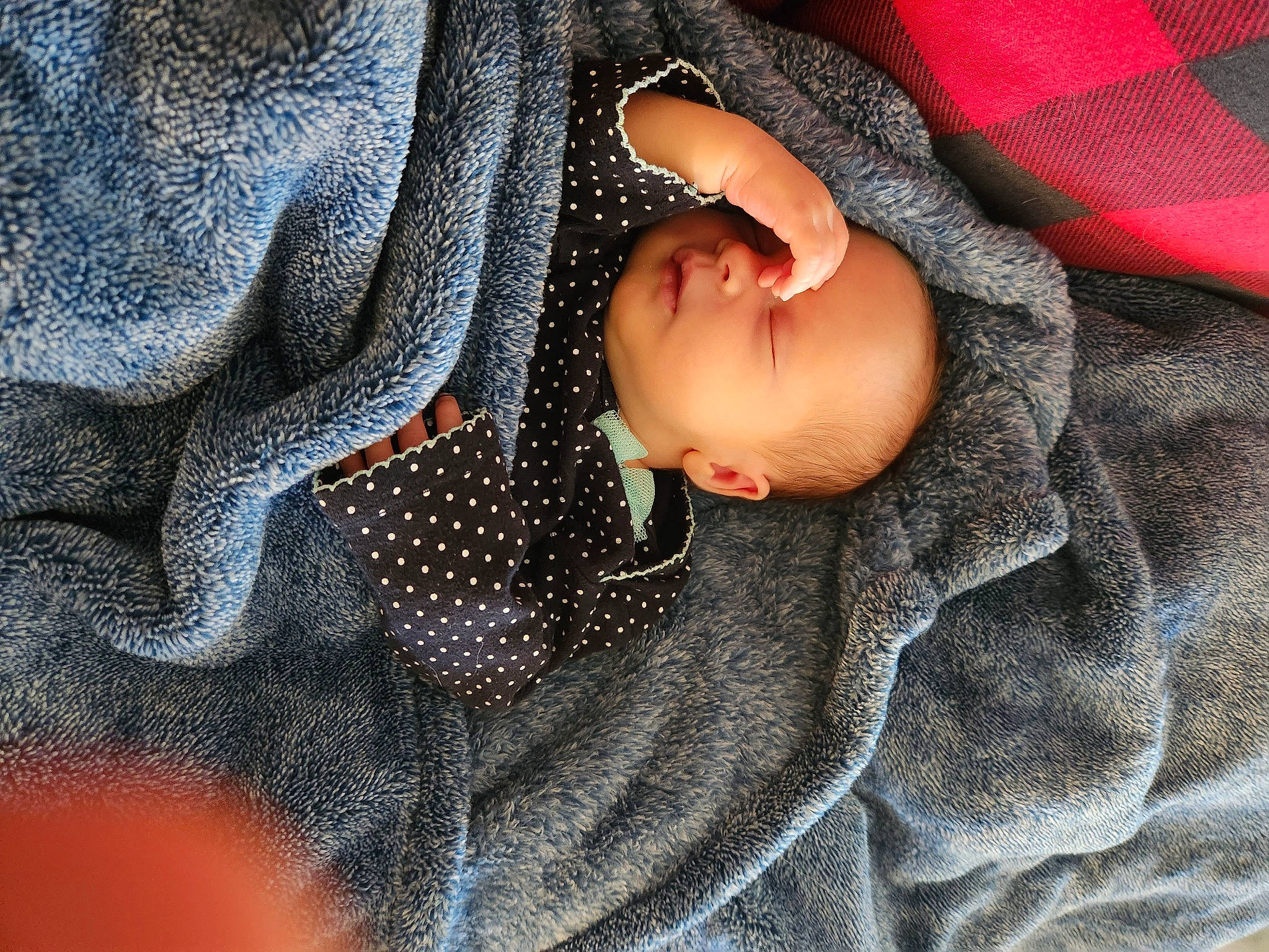 Isabelle is registered to the contest to win money with this photo: arm, baby, baby_products, baby_sleeping, baby_toddler_clothing, close_up, comfort, eye, face, grey, hand, head, human_body, linens, pattern, person, sleeve, textile, toddler, vertebrate
