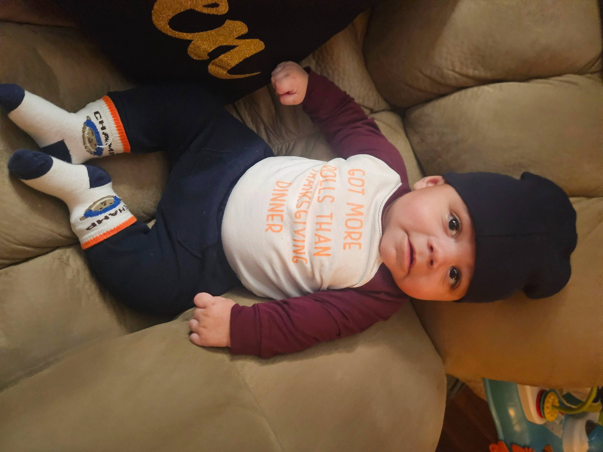 Tripp joined the competition — help win amazing prizes! baby, baby_toddler_clothing, child, comfort, elbow, finger, gesture, hat, headgear, headwear, human_body, human_leg, joint, knee, person, skin, sleeve, sportswear, t_shirt, thigh