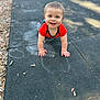 Deklan is registered to the contest to win money with this photo: active, baby, child, crawling, cute, daylight, face, fun, hands, happy, kid, mat, outdoor, person, playground, red_shirt, short_hair, smiling, wood_chips, young