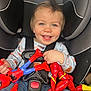 Deklan is registered to the contest to win money with this photo: action_figure, baby, blue_eyes, car_seat, child, closeup, cute, flash, happy, indoor, jeans, mohawk, pajamas, person, playful, seatbelt, smiling, spiderman, toddler, toy