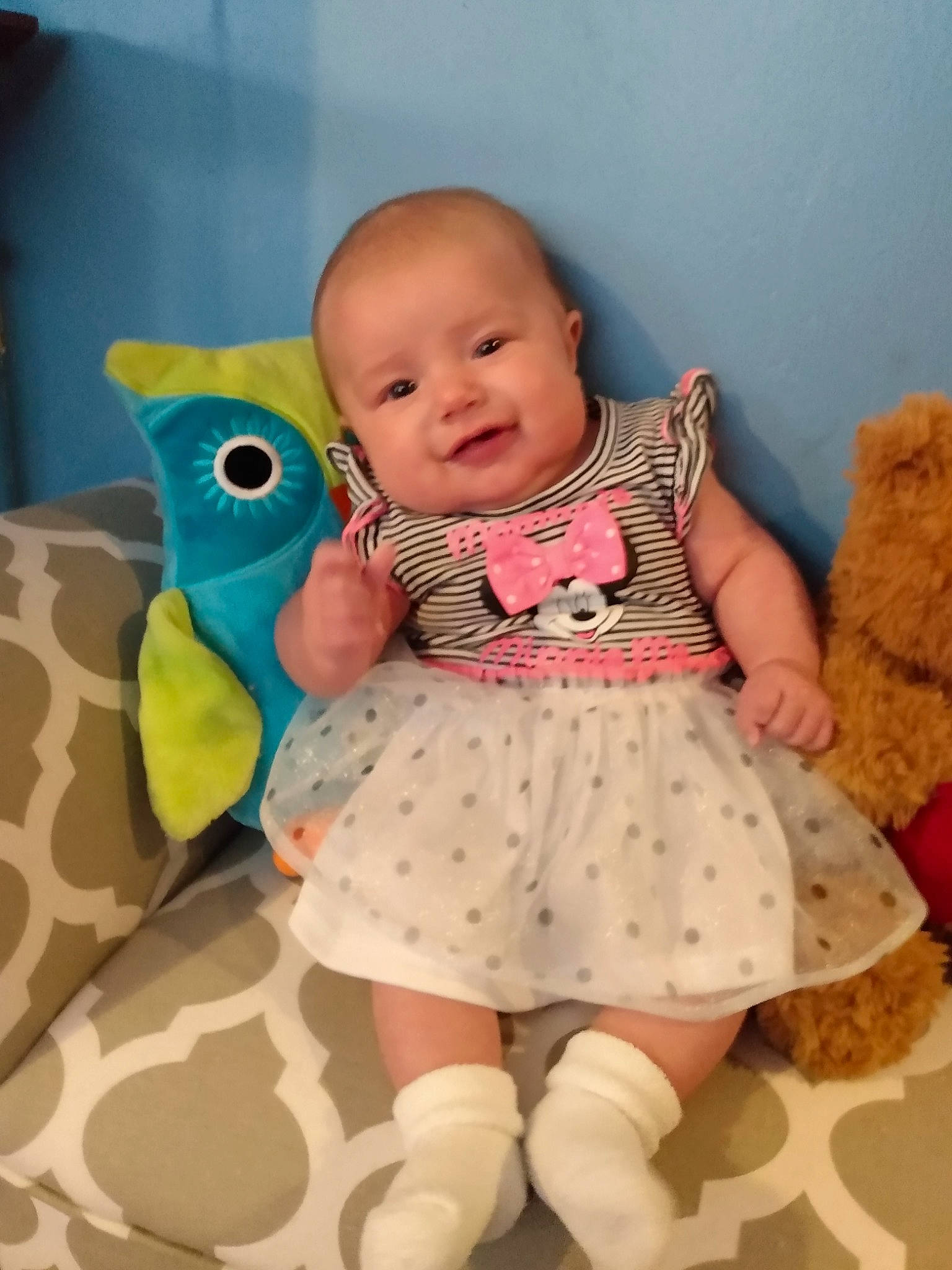 Stephanie is registered to the contest to win money with this photo: baby, beauty, blue, cheek, child, design, dress, eye, face, head, iris, joy, leg, lip, nose, pattern, person, pink, room, skin