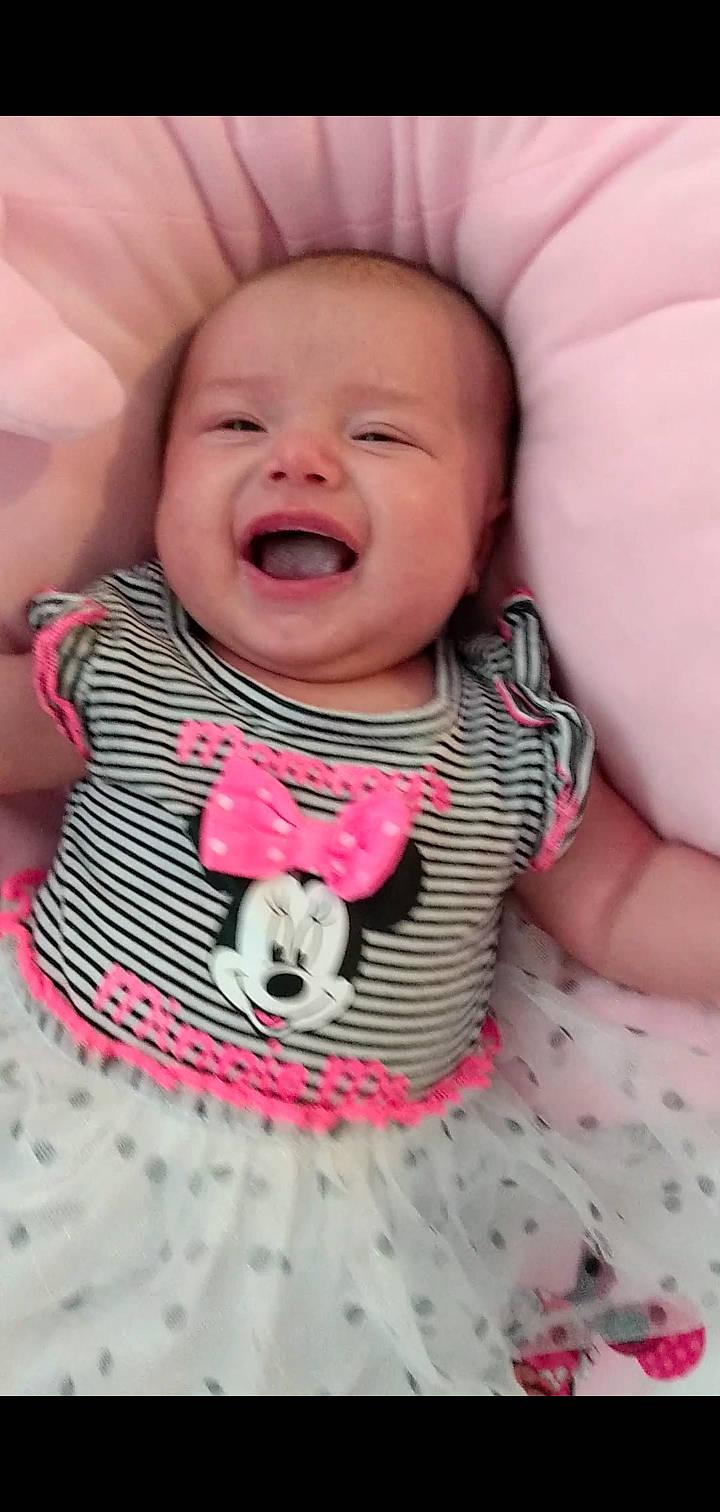 Stephanie is registered to the contest to win money with this photo: baby, baby_laughing, baby_making_funny_faces, baby_toddler_clothing, cheek, child, face, facial_expression, happy, head, laugh, lip, mouth, neck, nose, person, pink, skin, smile, toddler