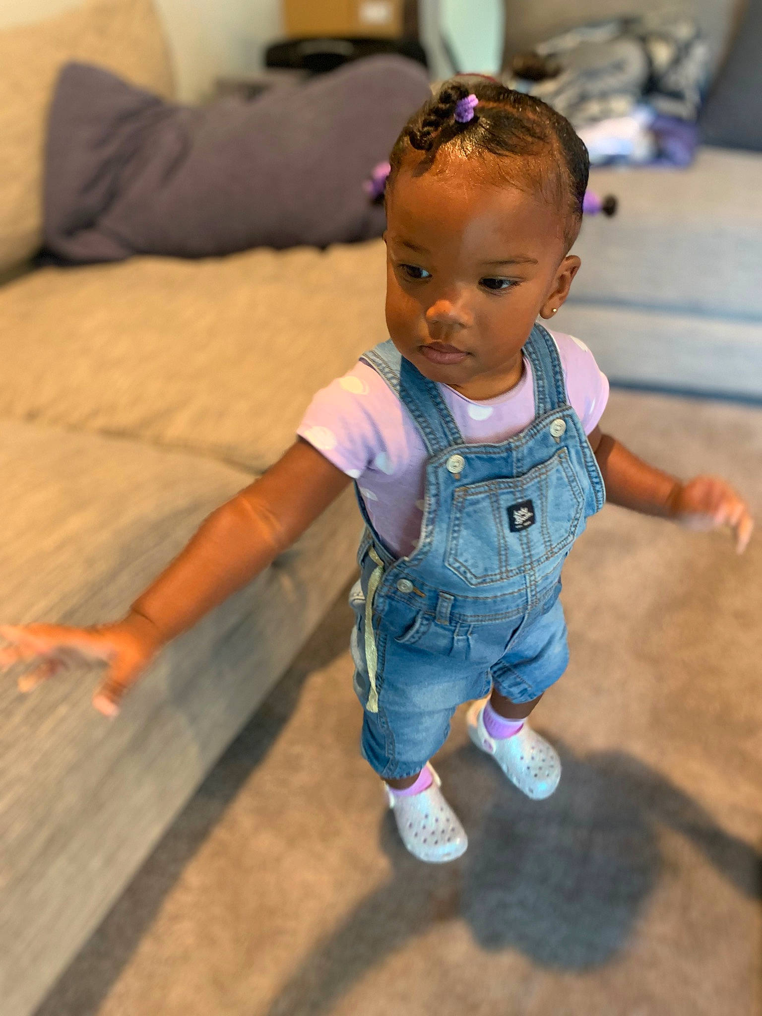 Janiyah joined the competition — help win amazing prizes! baby, baby_toddler_clothing, cheek, electric_blue, eye, face, floor, flooring, fun, happy, hardwood, head, human_leg, iris, leisure, person, skin, sleeve, toddler, trunk