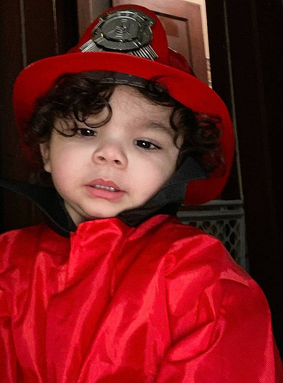 Jaxxon is registered to the contest to win money with this photo: baseball_cap, cap, carmine, child, chin, costume_hat, eye, fashion_accessory, flash_photography, hat, headgear, helmet, lip, magenta, outerwear, person, personal_protective_equipment, pink, red, sleeve