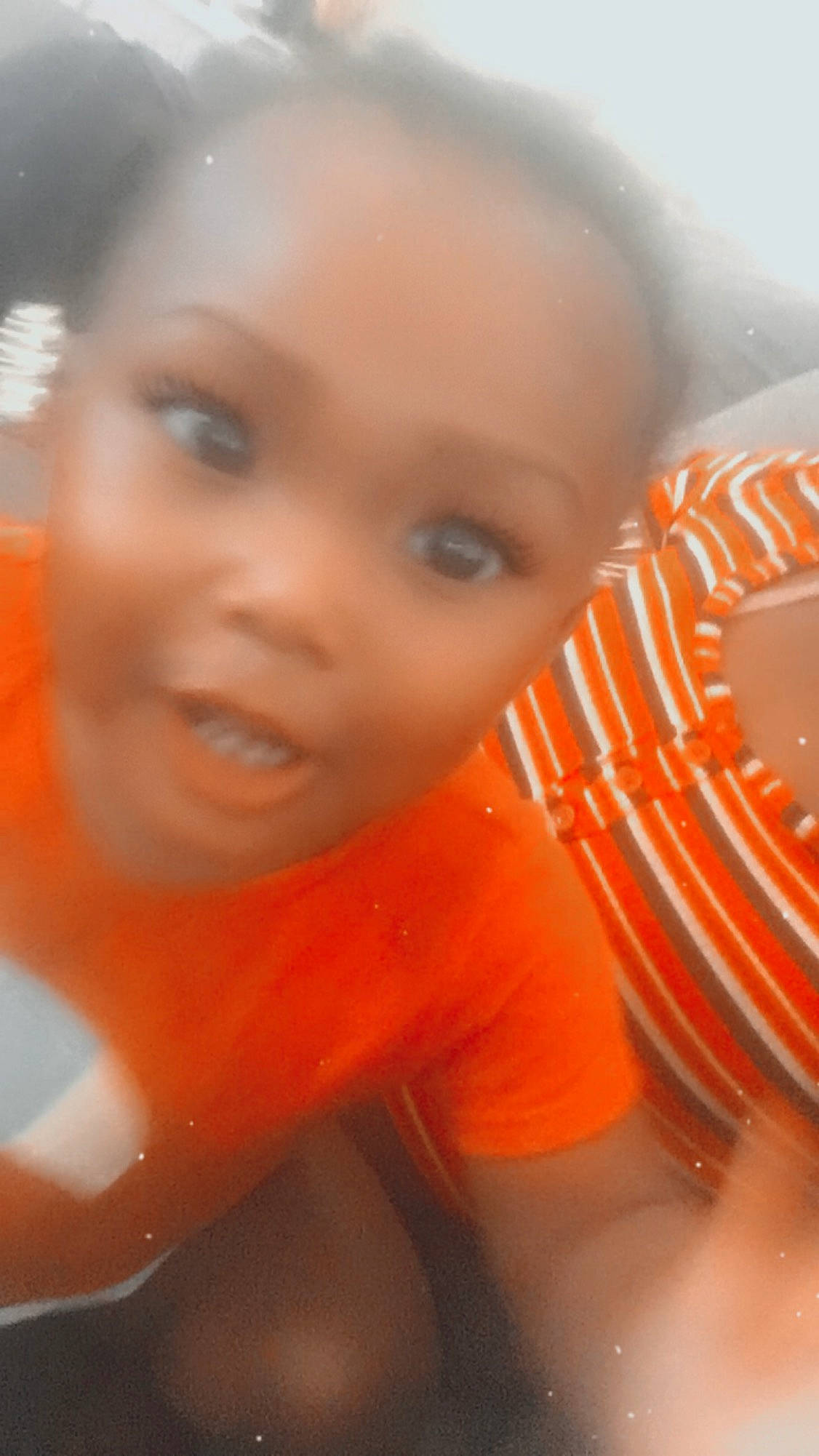 Eriel joined the competition — help win amazing prizes! baby, cheek, child, close_up, eye, eyebrow, face, forehead, head, lip, mouth, nose, orange, person, skin, smile, toddler