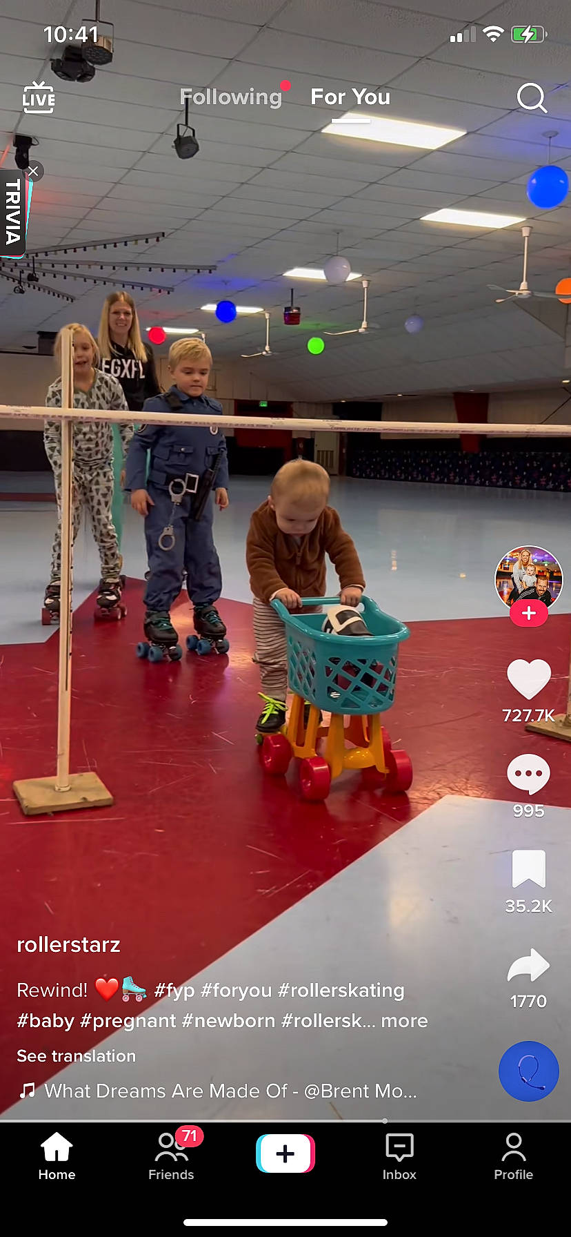 Lilly joined the competition — help win amazing prizes! balance, chair, child, display_device, entertainment, event, flooring, fun, games, indoor_games_and_sports, joy, leisure, magenta, person, play, recreation, room, toddler, toy